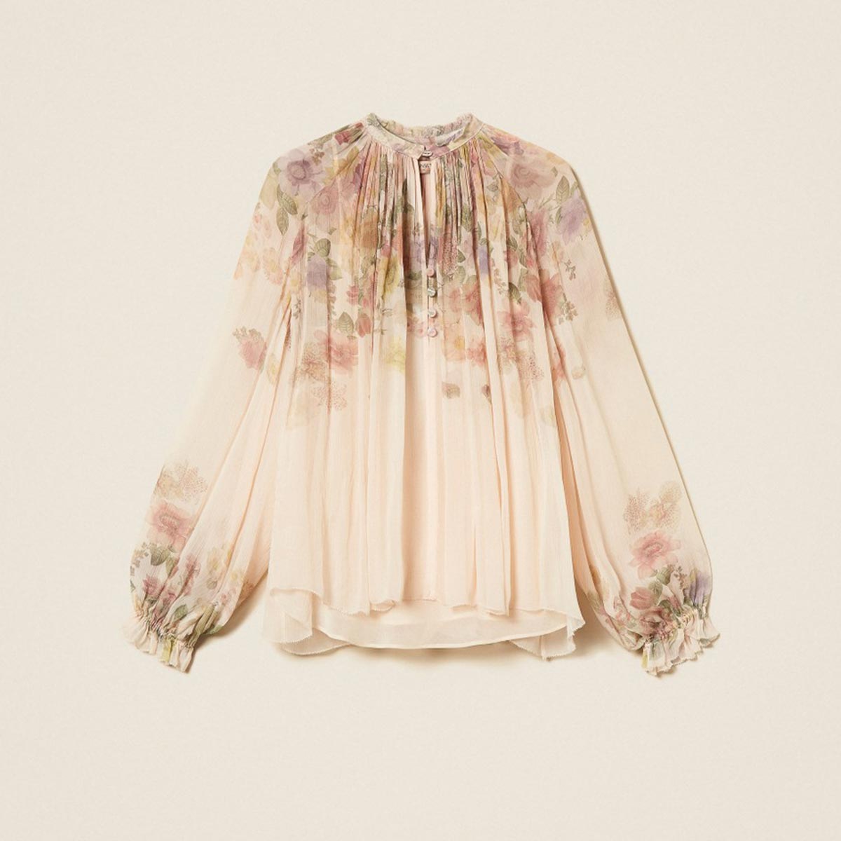 Blusa fantasia a fiori in creponne