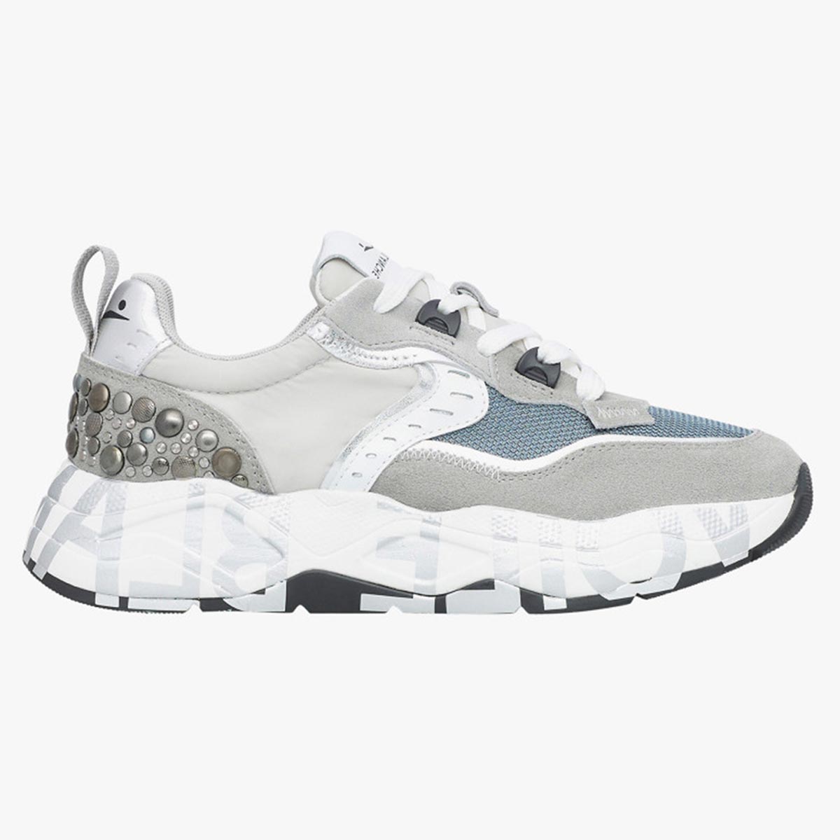 Sneaker in pelle e tessuto con borchie