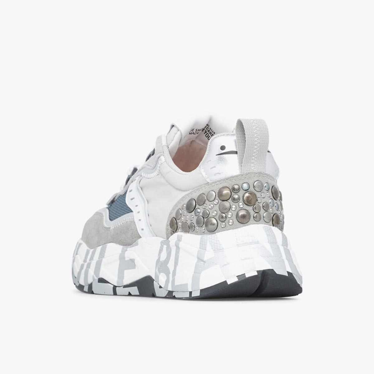 Sneaker in pelle e tessuto con borchie