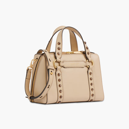 Borsa a mano in pelle con borchie e tracolla