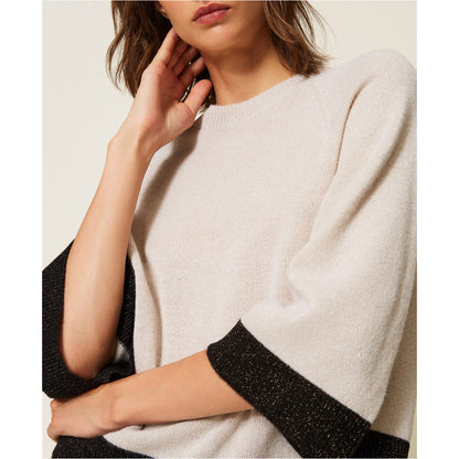 Maglia cropped in lana e cashmere con lurex