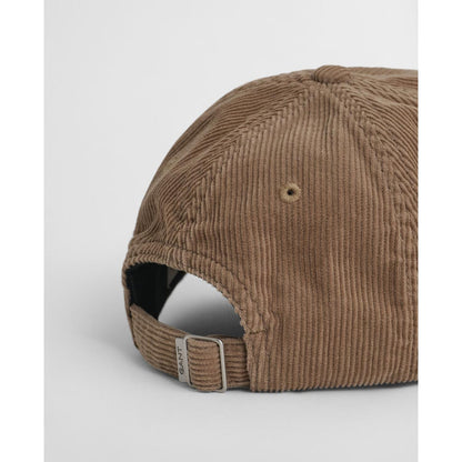 Cappellino con visiera in velluto a coste