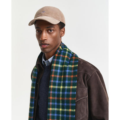 Cappellino con visiera in velluto a coste