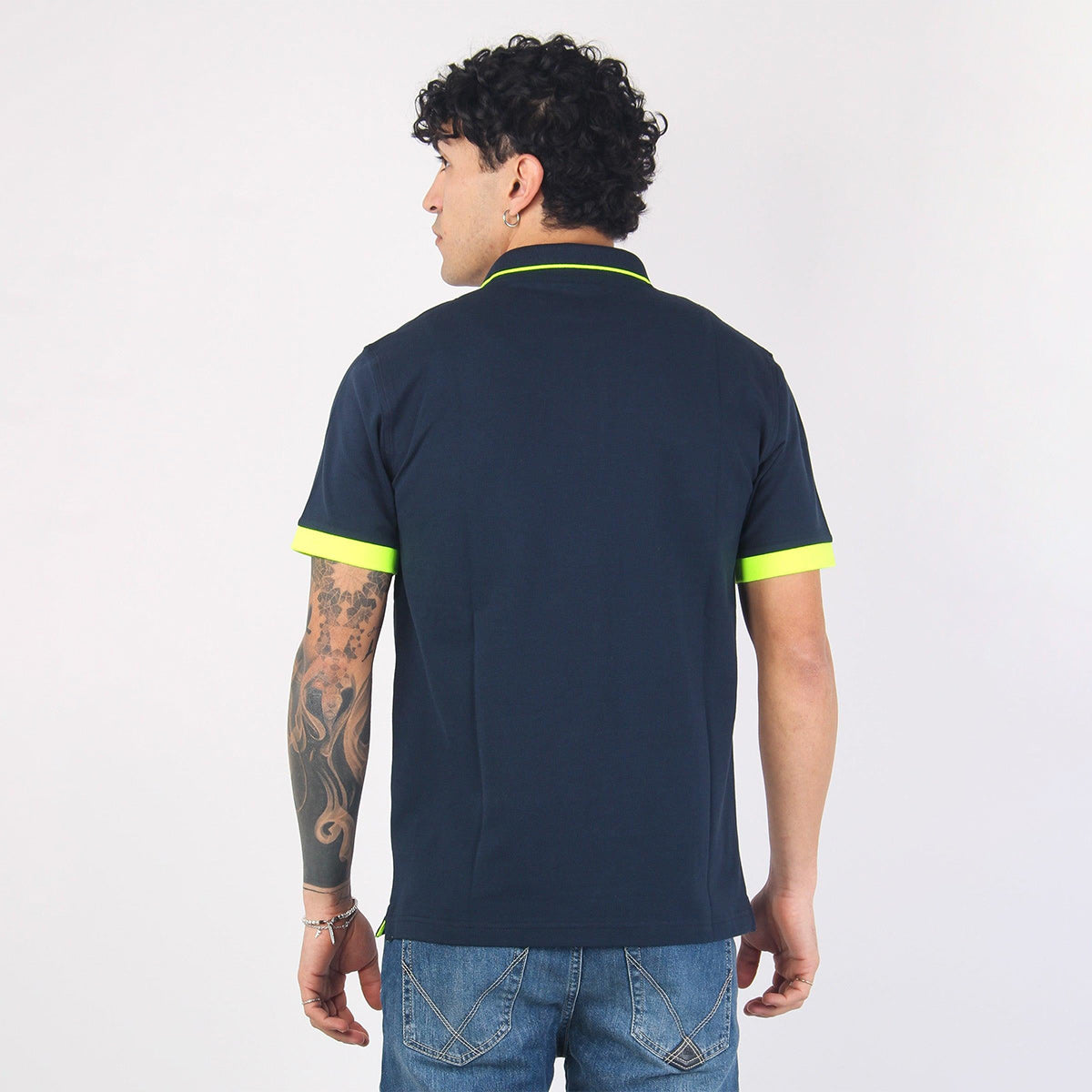 Polo in piquet con dettagli in contrasto fluo