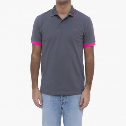 Polo in piquet con dettagli in contrasto fluo