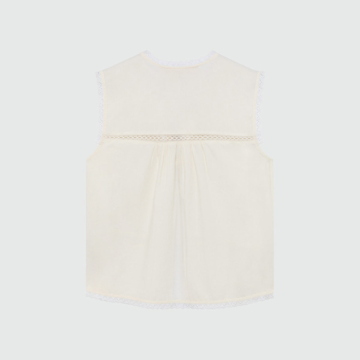 Camicia smanicata con ricami