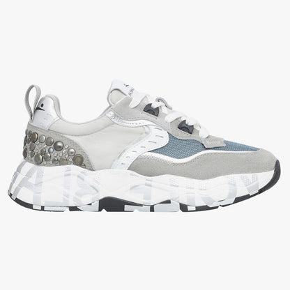 Sneaker in pelle e tessuto con borchie