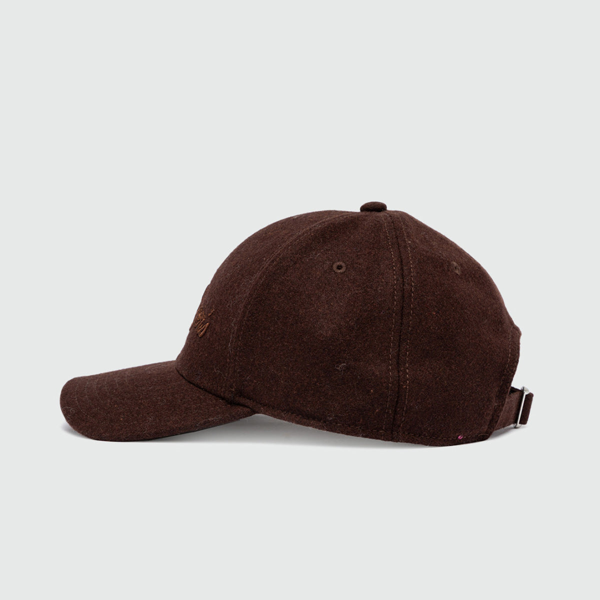 Cappello con visiera in lana marrone