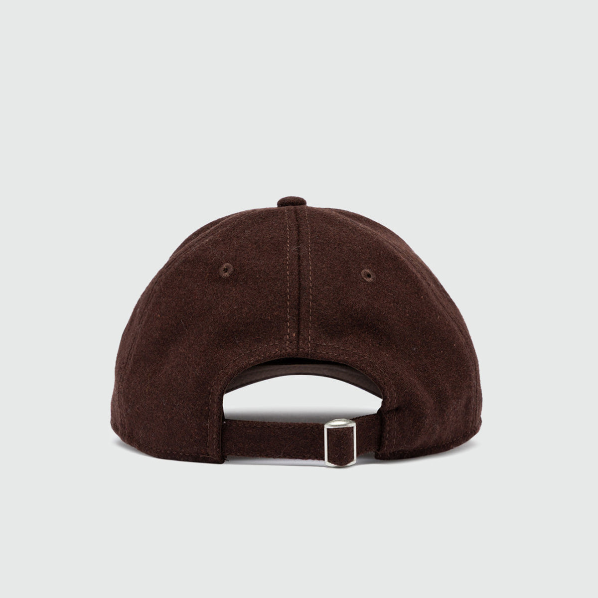 Cappello con visiera in lana marrone