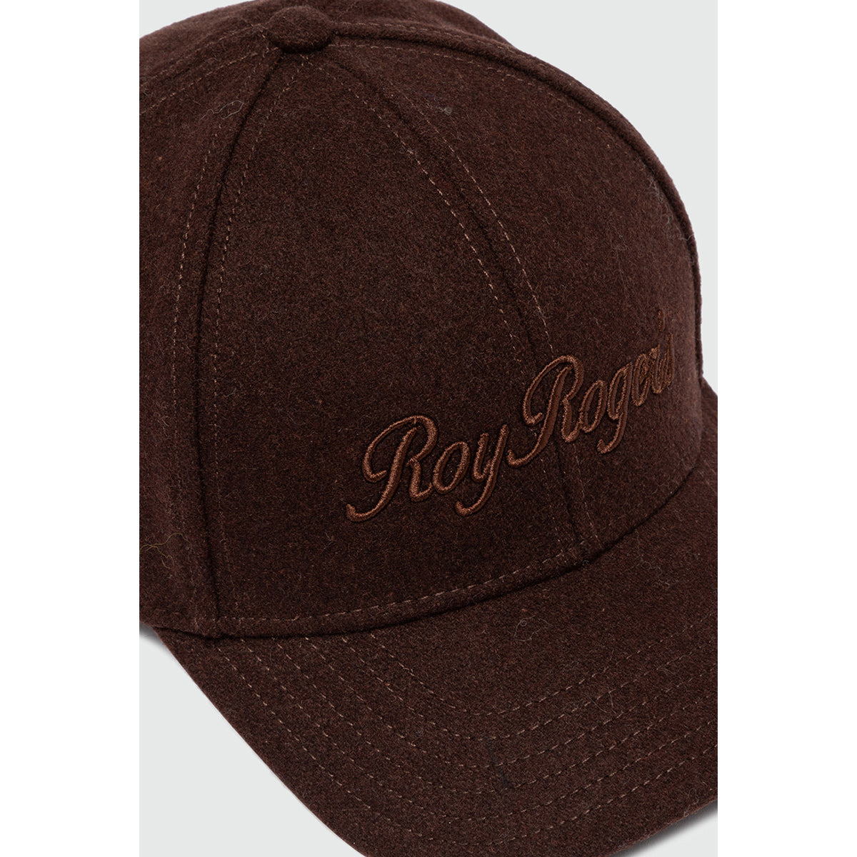 Cappello con visiera in lana marrone