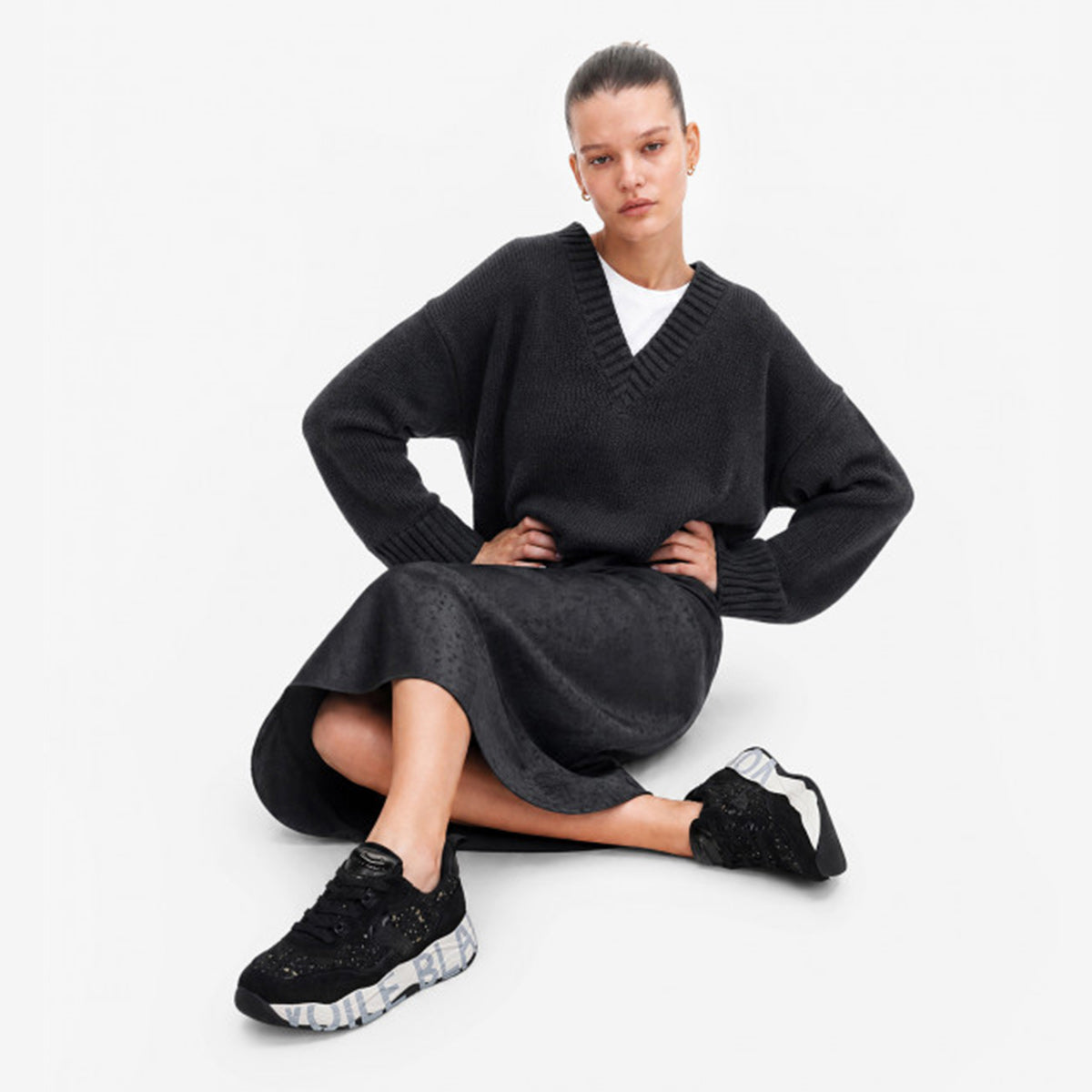 Sneaker in pelle e tessuto nera