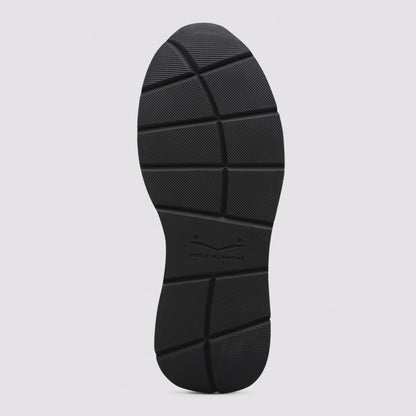 Sneaker in pelle e tessuto lavorata