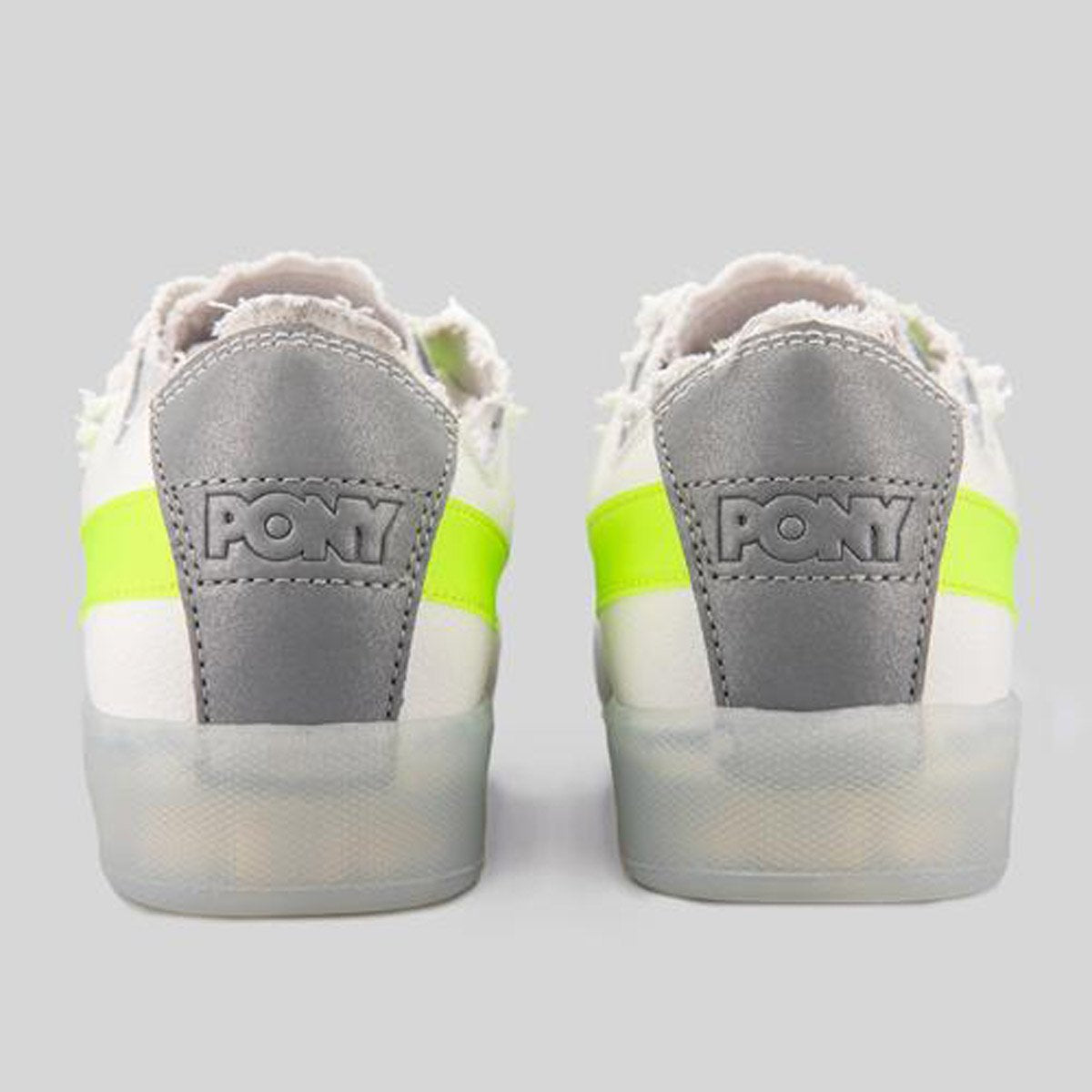 Sneaker in pelle bianca e verde fluo